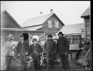 Figure 2Photograph of Dr.J.B.Tyrrell’s survey party, with Tyrrell at far. G.M. Dawson is in middle.Left, Red Deer, Alberta. Photographer: J.B.Tyrrell (1886)
